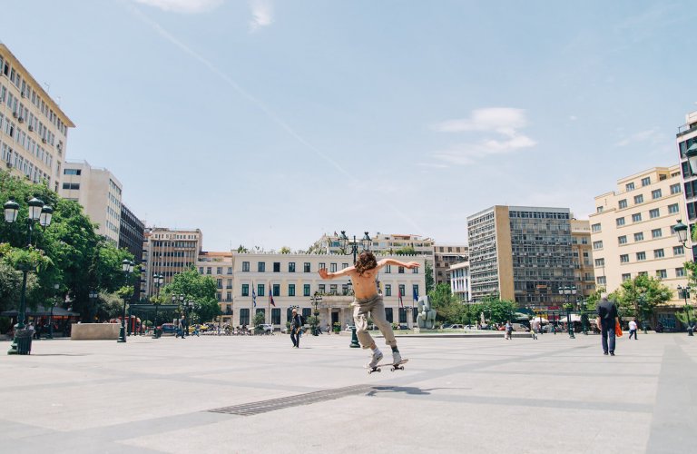 Teenager skating at Kotzia Square, Athens