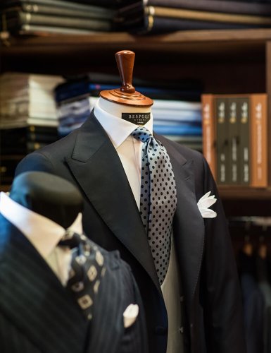mannequins dressed with men's suits