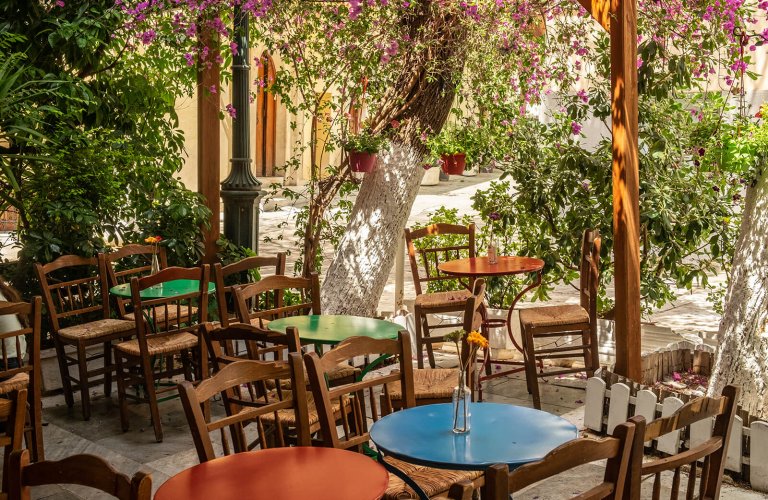 Traditional tables and chairs at Glykis in Plaka, Athens. 
