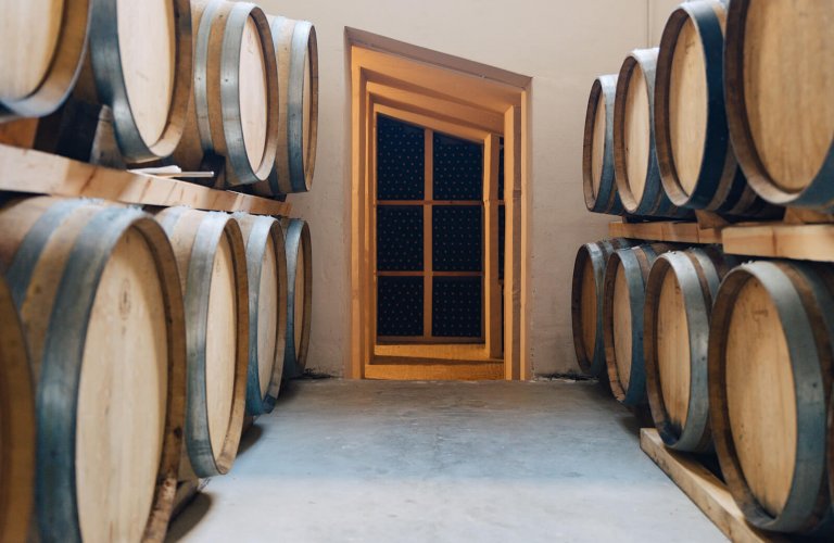 wooden barrels at Mylonas winery