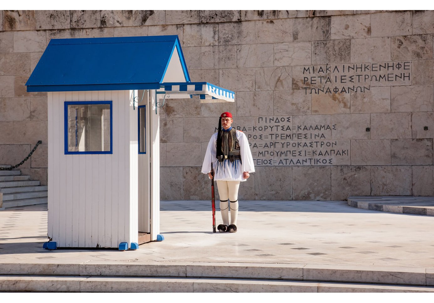 an Evzone standing guard in front of the Greek Parliament in Athens