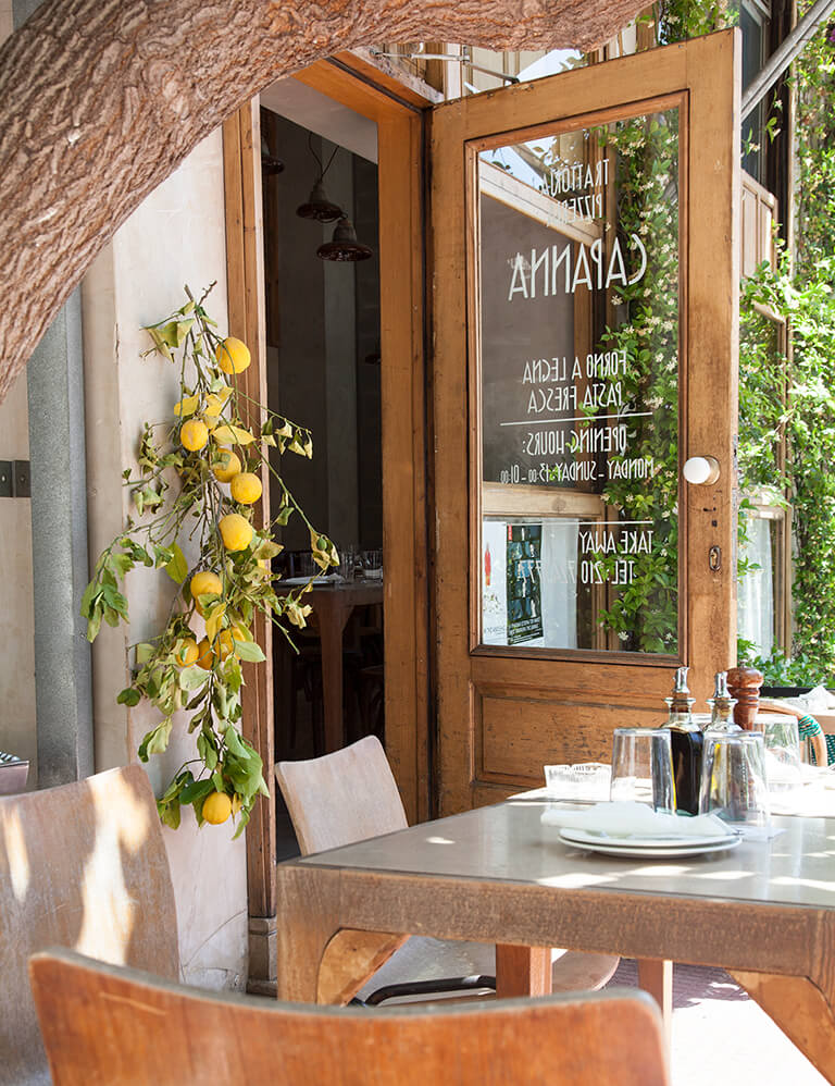 Capanna's outdoor tables are great for people-watching.  | Photo: Eleni Veziri 