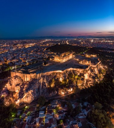 The Acropolis Hill at dusk, shot from a drone