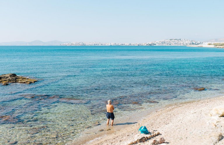 a man at a beach at Palio Faliro in Athens