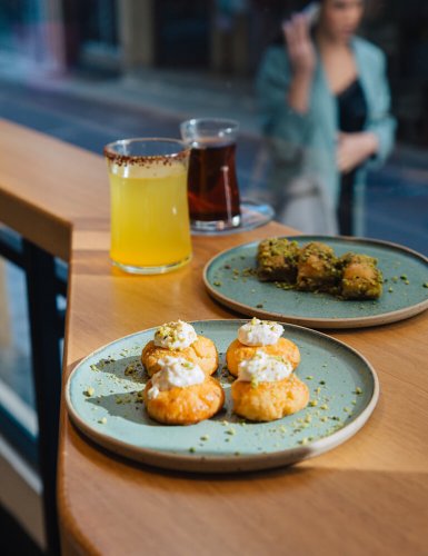 Sweets on two plates at Feyrouz in Athens. 