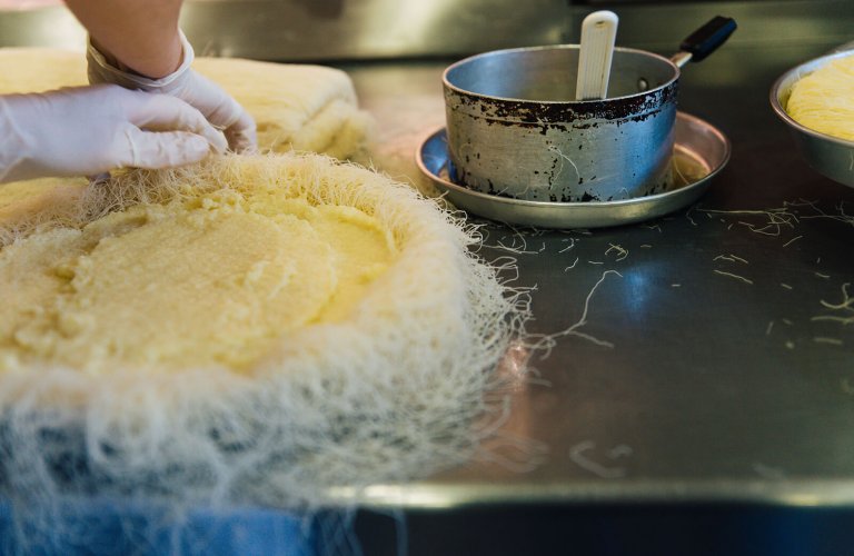 Someone making galaktoboureko pastry in Athens. 