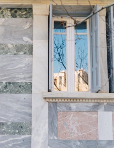 the National Observatory mirrored on a window