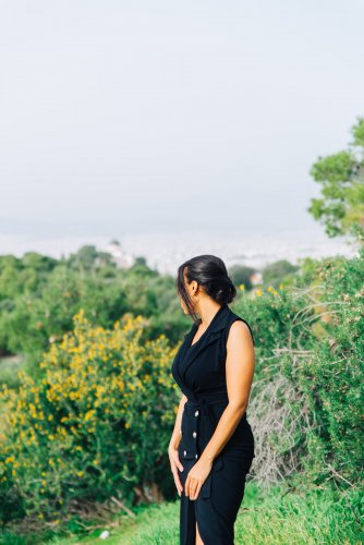 a woman wearing black at Philopappou Hill in Athens