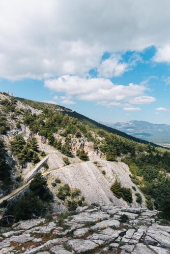 a mountain slope and a view of the sky and clouds in Mount Pendeli in Athens