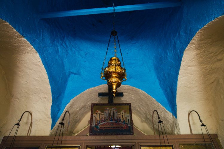 a blue ceiling of the inside of a chapel in Mount Pendeli in Athens