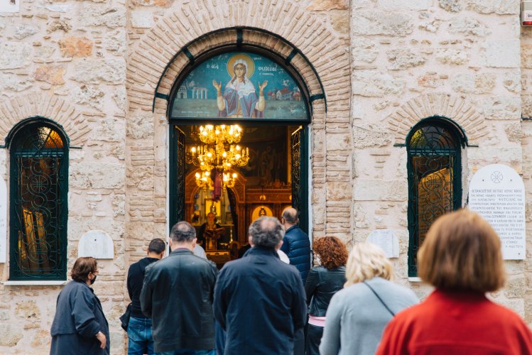 people entering an orthodox church