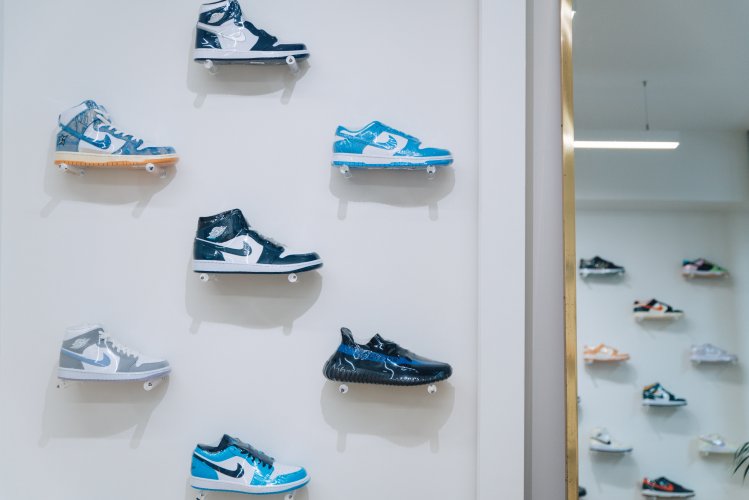 sneakers on display at the shop's walls