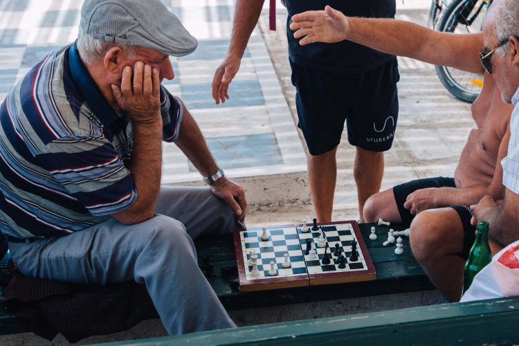 Older men playing chess.