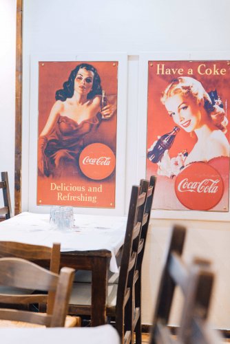 two vintage advertisements of coca-cola.