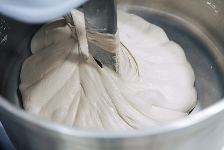 a chef mixing the dough.