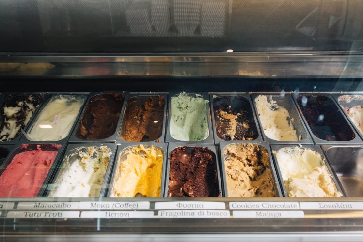 a window display with ice cream flavours.