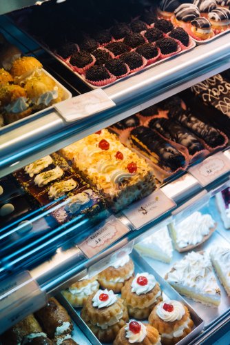 a window display with pastry.