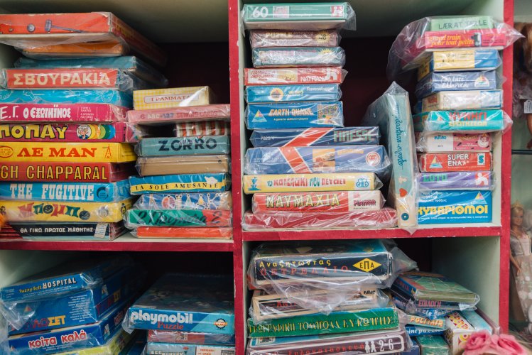 vintage board games on shelves.