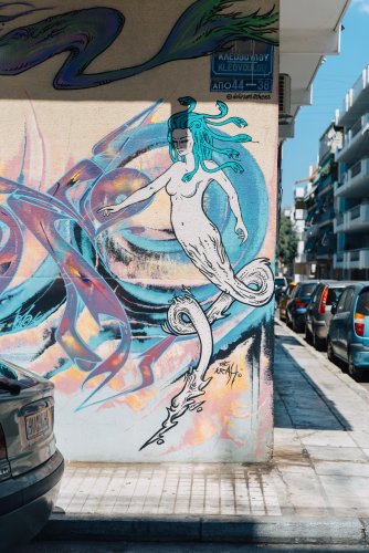 a mural depiscting a mythical female figure.