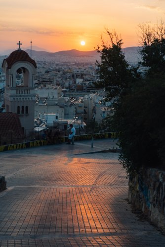 view from a hill during sunset.