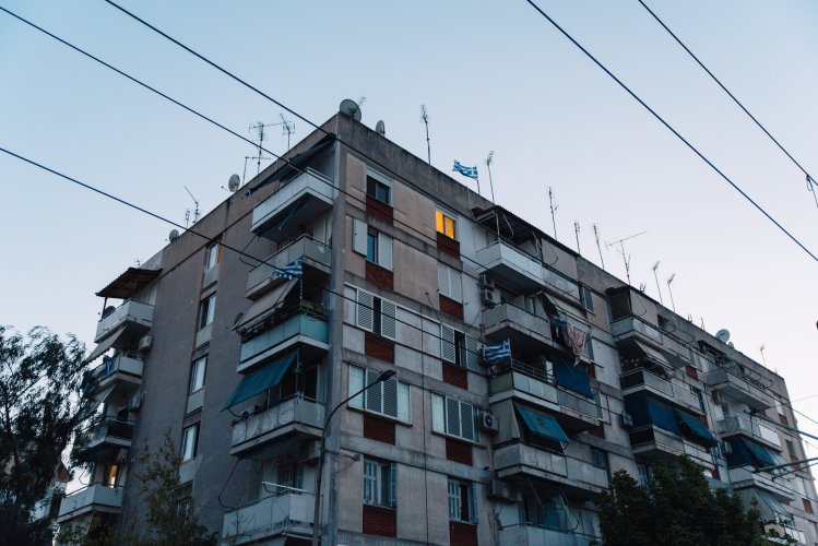 block of flats, blue sky.