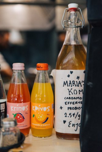 bottles with beverages on the counter. 