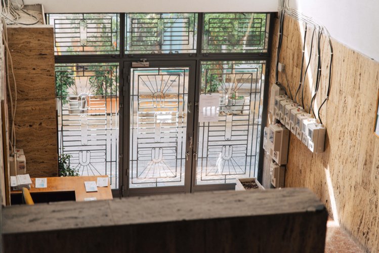 photo of the inside of an entrance door of an apartment block