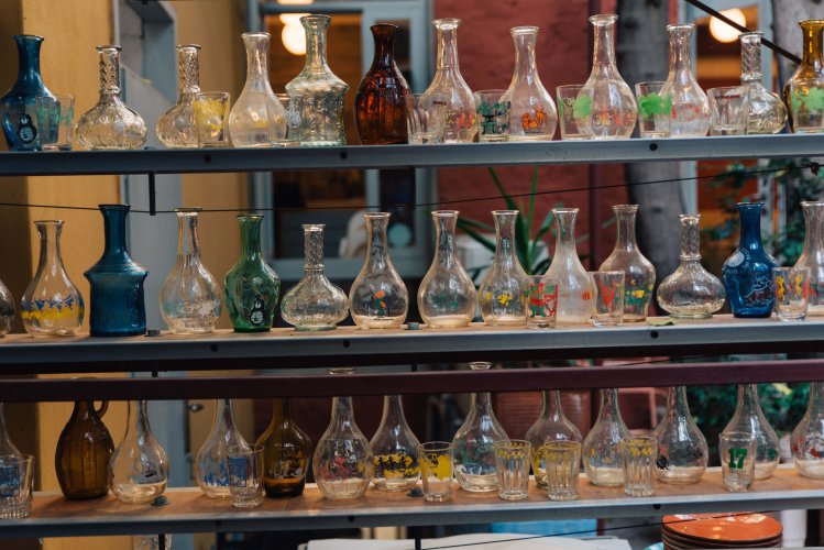 shelves with glass bottles