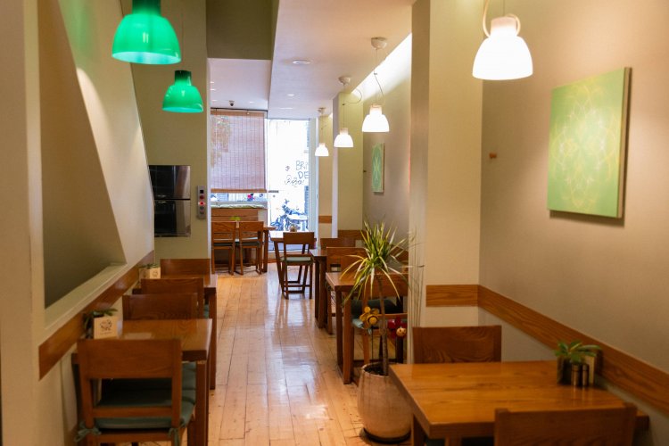 the interior of a restaurant, set tables.