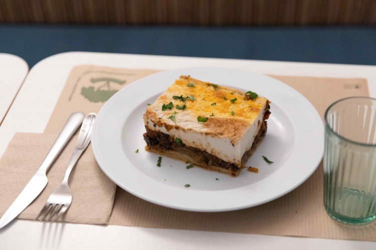a piece of moussaka served on a table