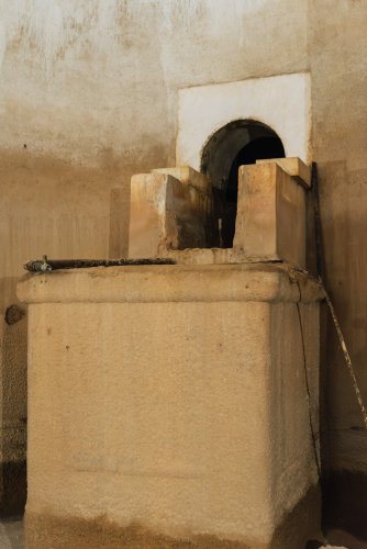 The alter-like tunnel entrance at the far end of the cistern leads into a 15-mile network carved beneath the city. | Photo: Thomas Gravanis