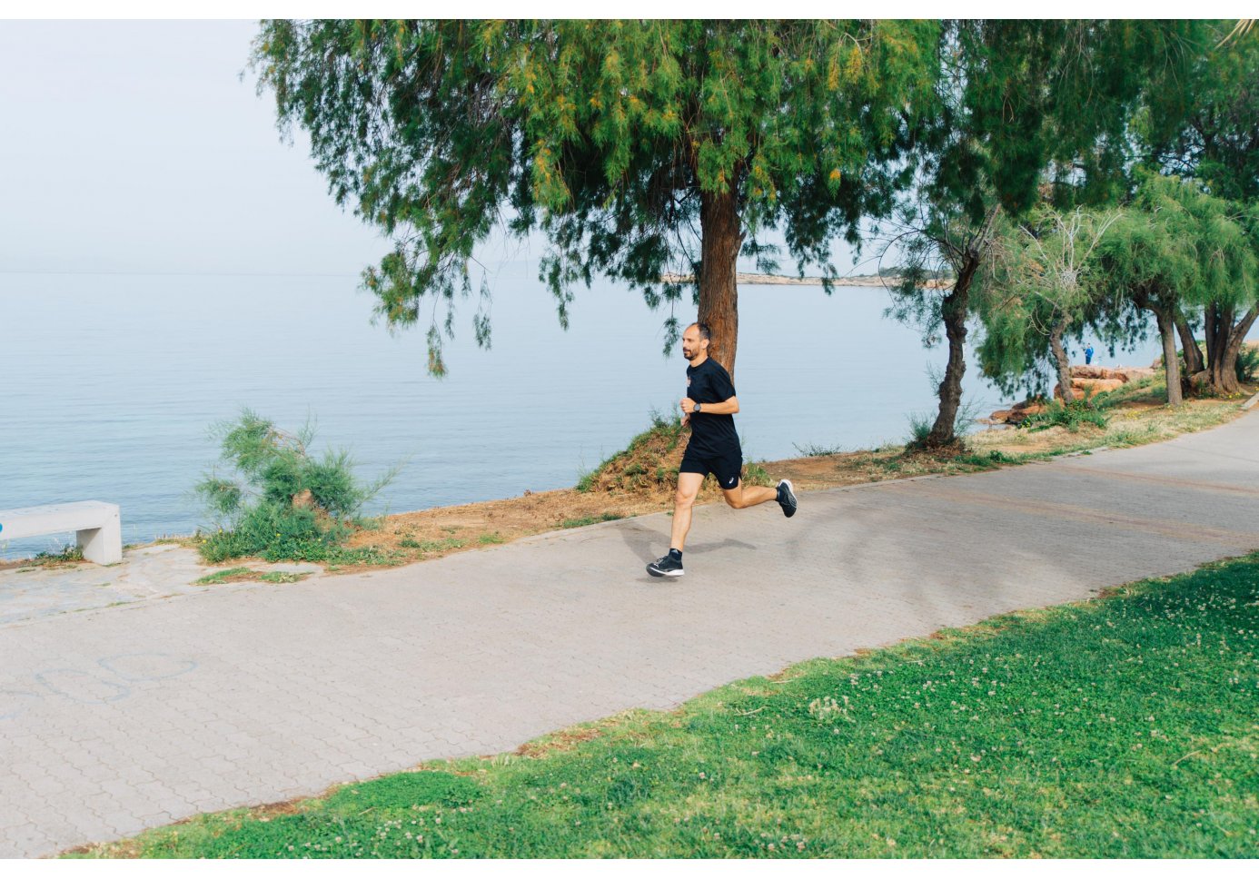 A man running at Palio Faliro promenade in Athens