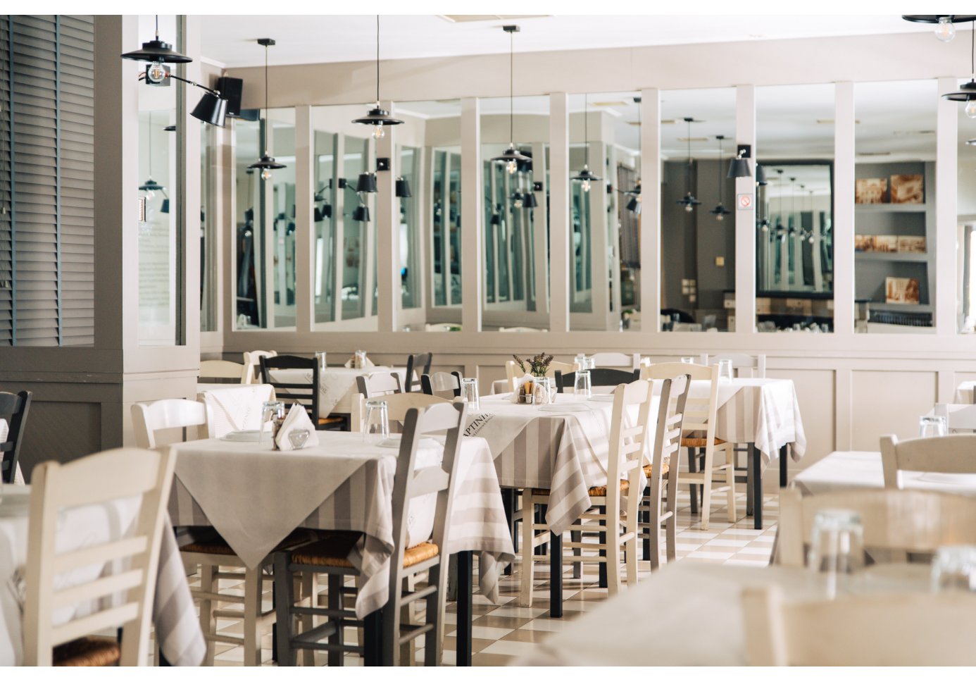 set tables at a restaurant.