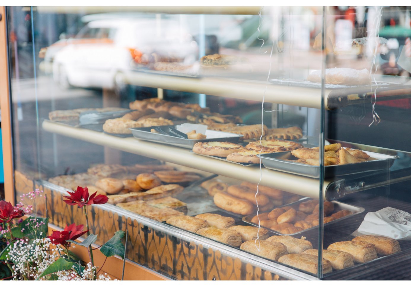 a window display with pastry.