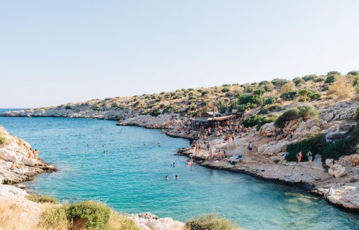 COOL REFRESHMENT - South of the long beaches at Little and Big Kavouri, the fingers of the Athens Riviera create dozens of small coves where Athenians take a dip and chill during the summer.